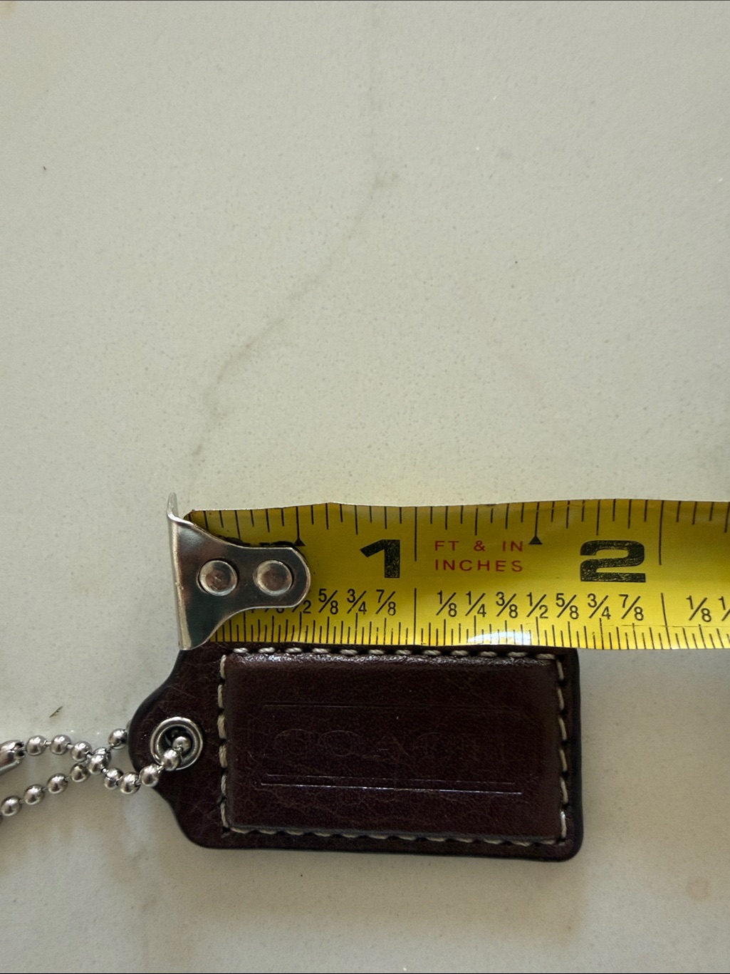Coach Hang Tag